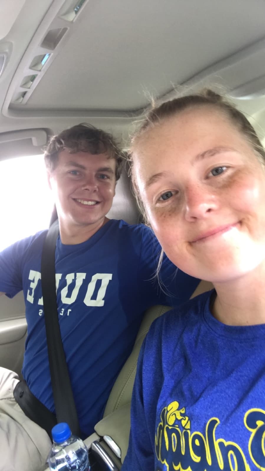 Kaitlyn and Chris taking a selfie in the car